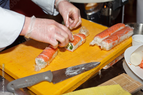 chef preparing sushi in the kitchen