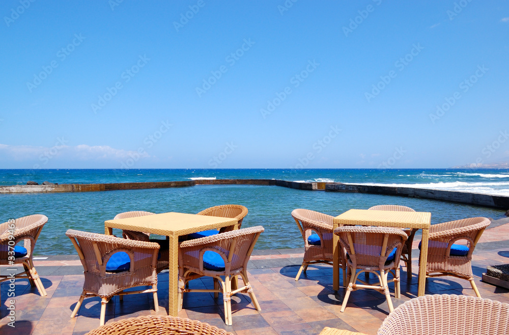 Outdoor restaurant at the seafront, Tenerife island, Spain