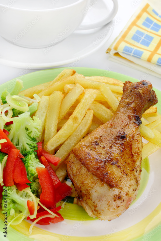 Fried chicken leg with french fries Fried chicken leg with french fries
