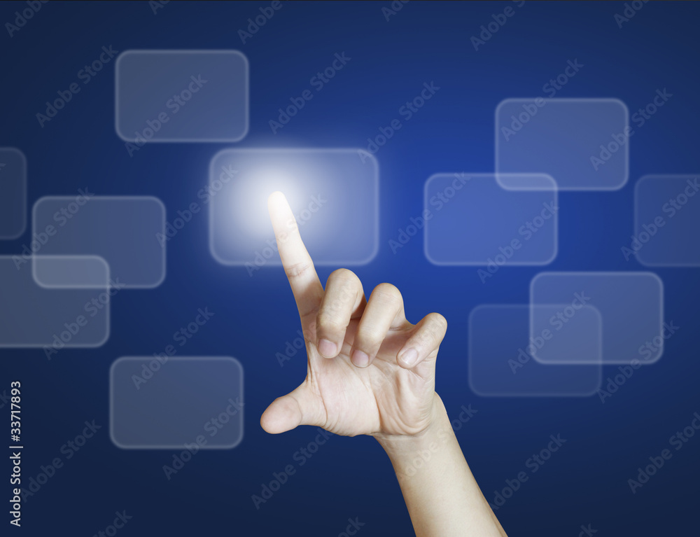 hand pushing on a touch screen interface hand pushing on a touch screen interface