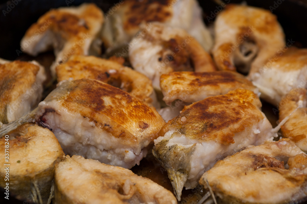 Delicious fish fillets roasted in the frying pan