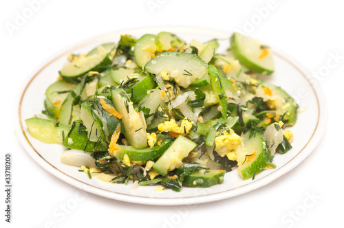 Green cukini fried with eggs and spices
