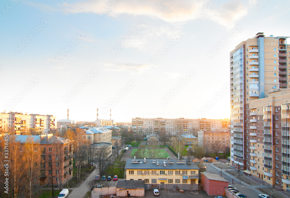 Naklejka premium urban buildings at sunset