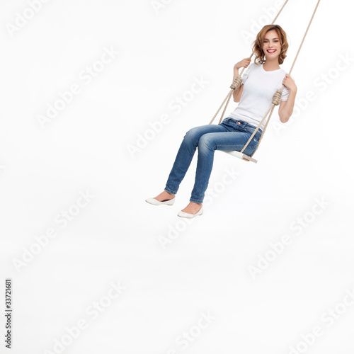 young woman swinging