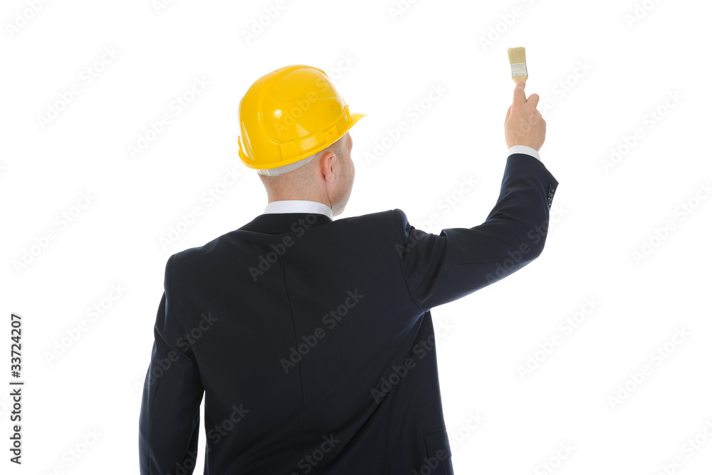 businessman with a brush in his hand businessman with a brush in his hand