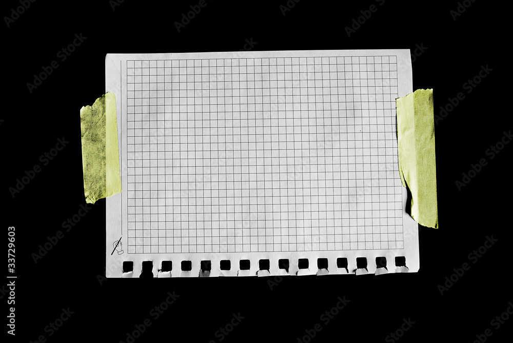 A sheet of paper isolated on black.