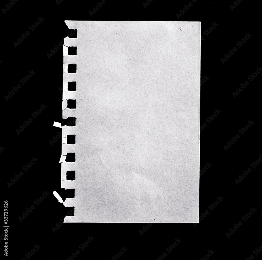 A sheet of paper isolated on black.