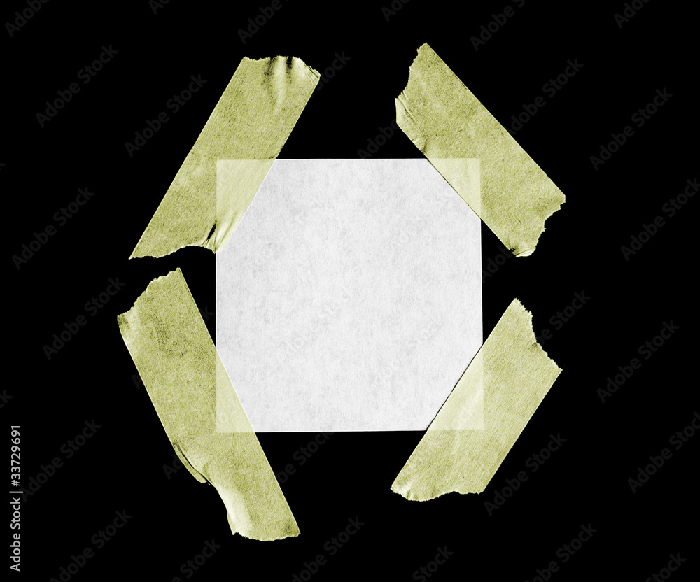 A sheet of paper isolated on black.
