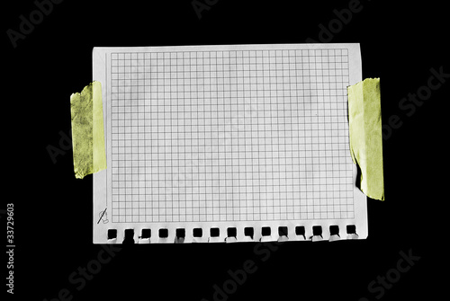 A sheet of paper isolated on black. photo