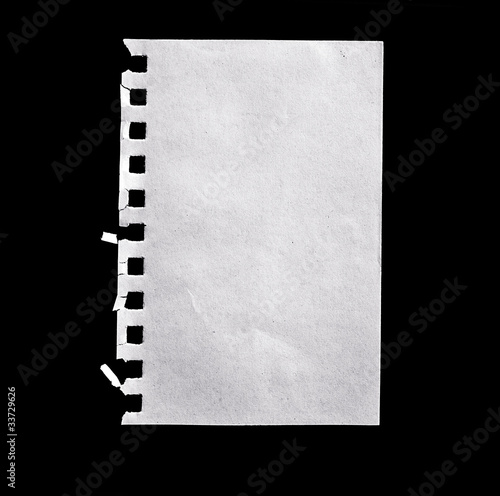 Obraz na płótnie A sheet of paper isolated on black. w salonie