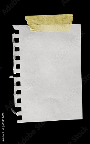 A sheet of paper isolated on black.
