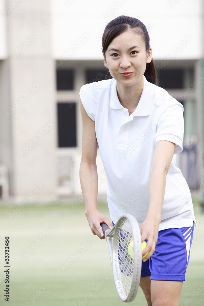 テニスをする女子高校生 Stock Photo Adobe Stock