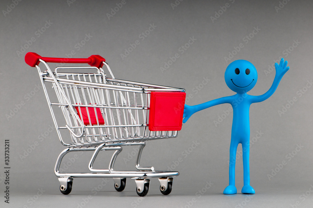 Happy family with shopping cart Happy family with shopping cart