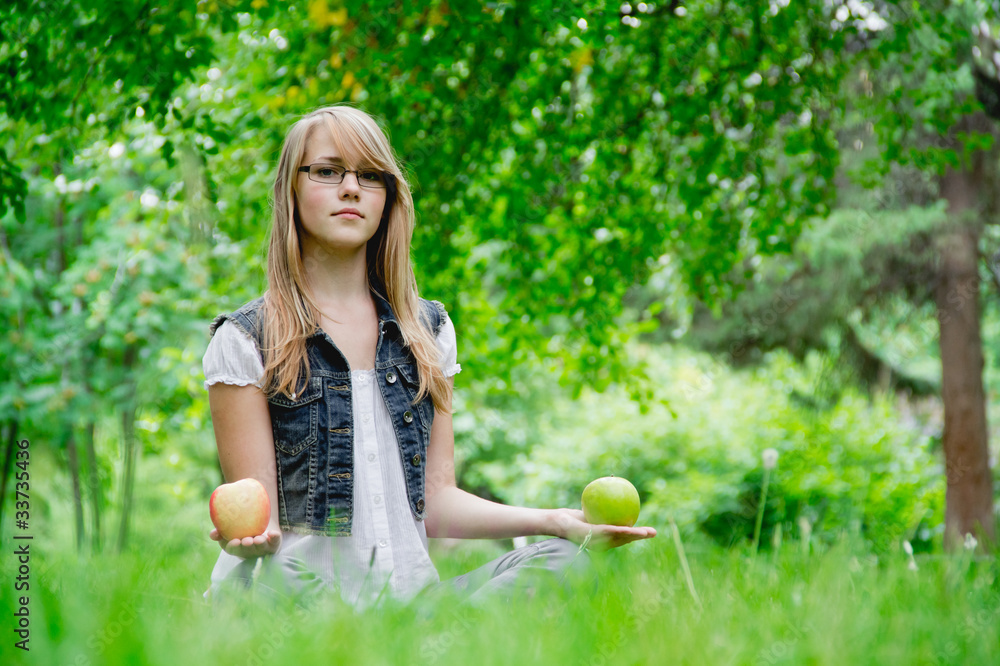 beautiful girl with the apples on the grass beautiful girl with the apples on the grass