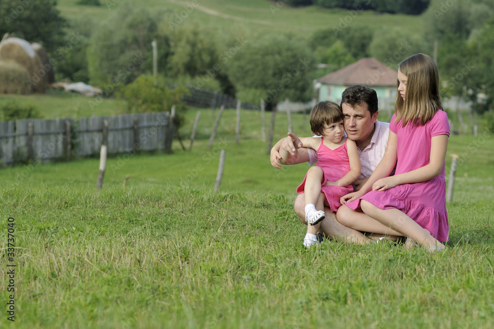 Obraz premium man relaxing in nature with children