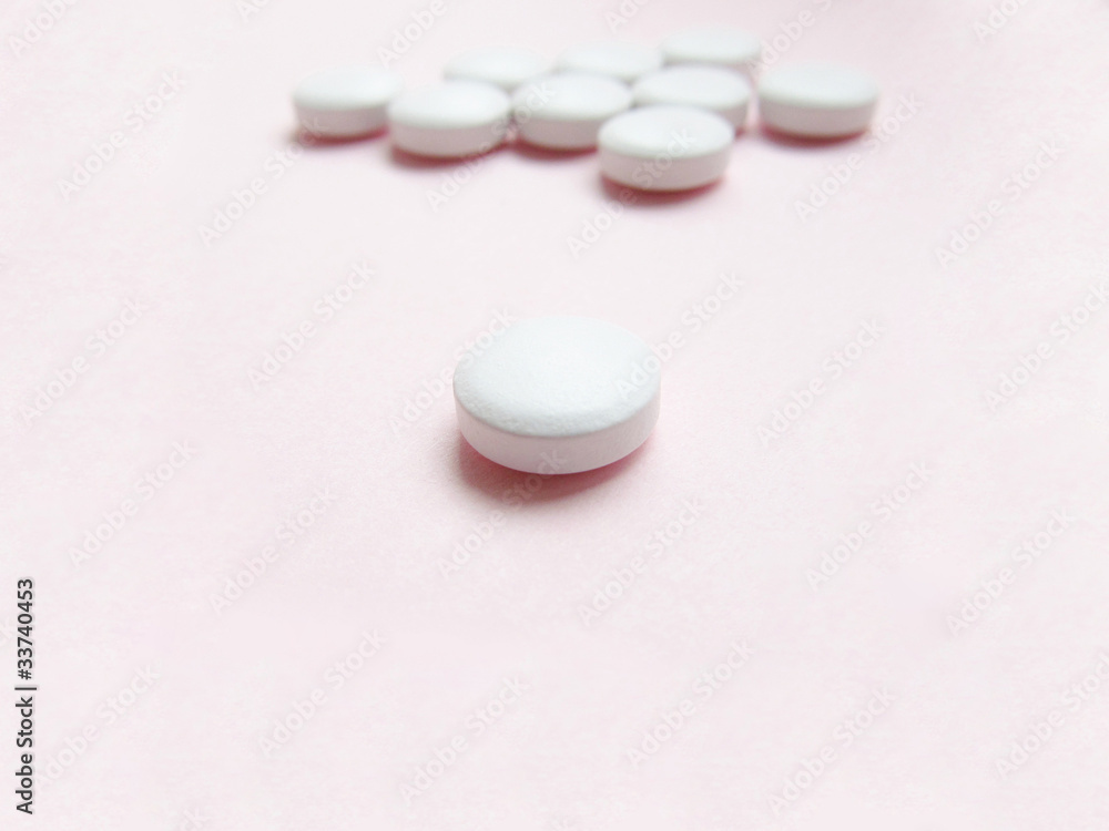 Pill in front of many pills Pill in front of many pills