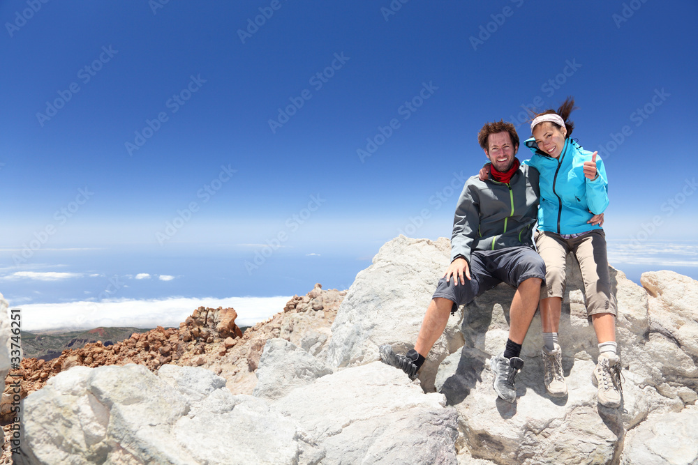 People on mountain top hiking