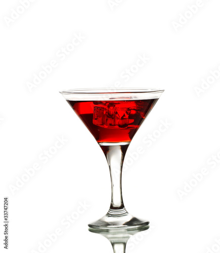 Red martini cocktail with ice cubes