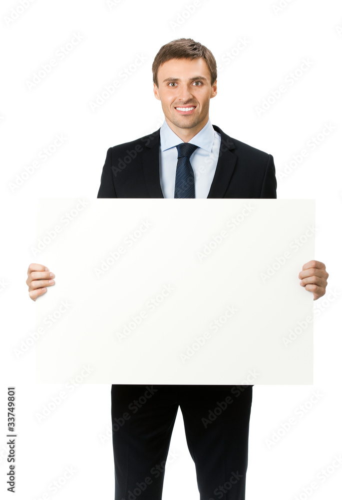 Happy business man showing blank signboard, isolated Happy business man showing blank signboard, isolated