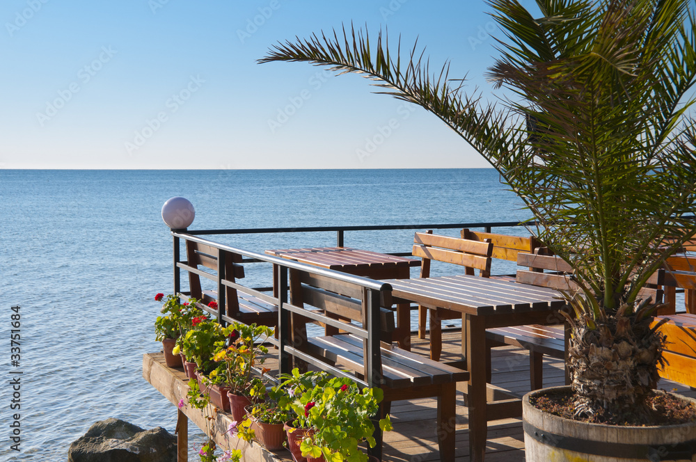 Fototapeta premium Terrace of a cafe on the sea