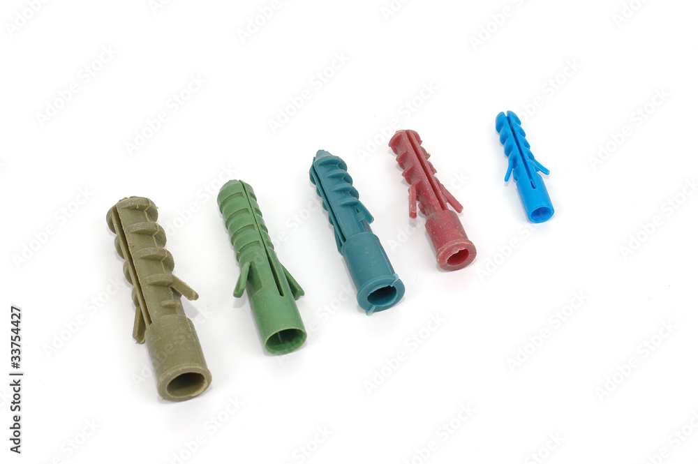 Colored rawl plugs on white background Colored rawl plugs on white background