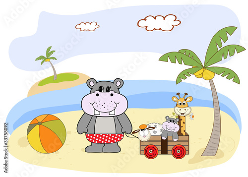 hippo plays on the beach