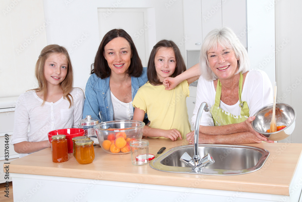 Portrait of grandmother, mother and kids in kitchen Portrait of grandmother, mother and kids in kitchen