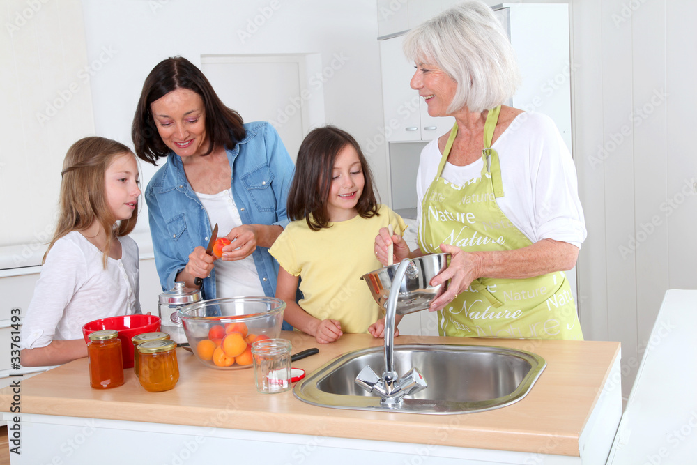 Portrait of grandmother, mother and kids in kitchen Portrait of grandmother, mother and kids in kitchen