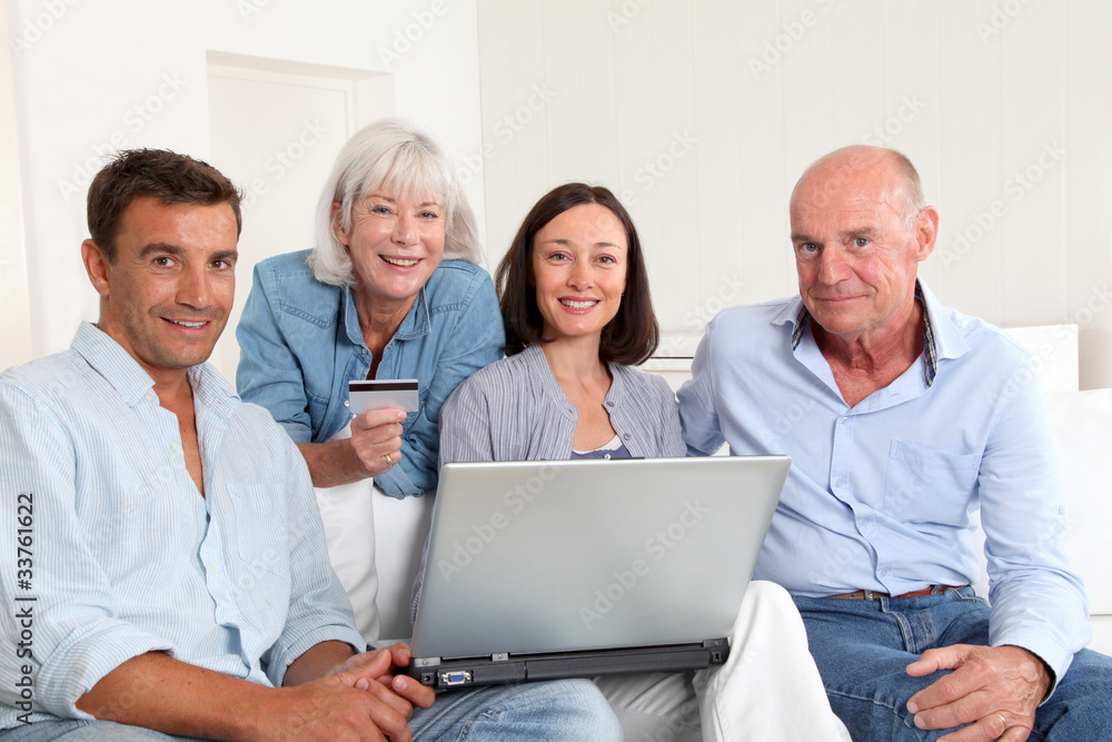 Senior people with couple doing shopping online Senior people with couple doing shopping online