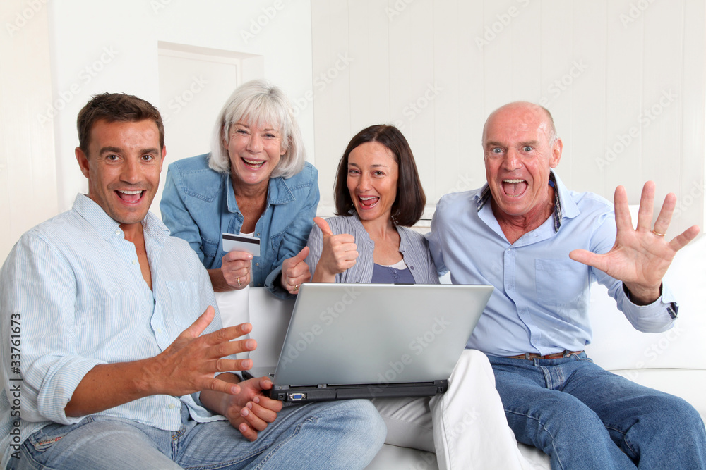 Senior people with couple doing shopping online Senior people with couple doing shopping online
