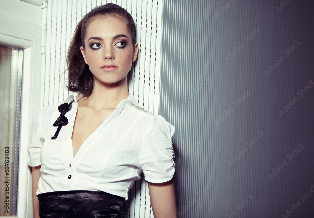 Beautiful ballet dancer relaxing after exercise