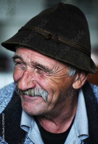 Portrait of old man with mustache