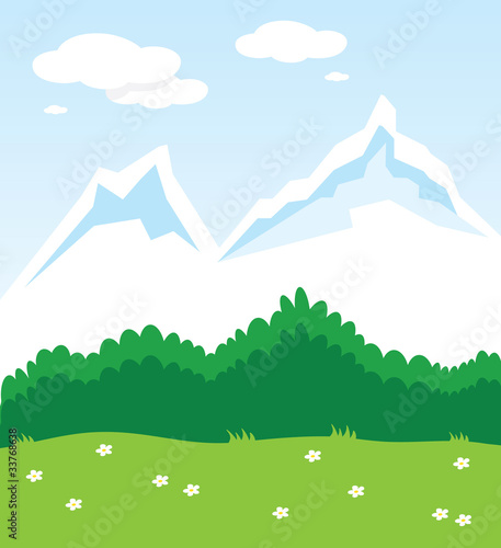 Beautiful green landscape with mountains covered with snow