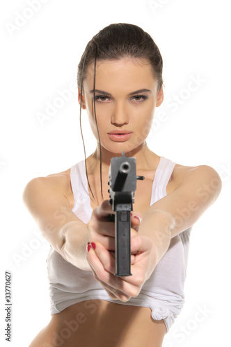 Young sexy woman with gun