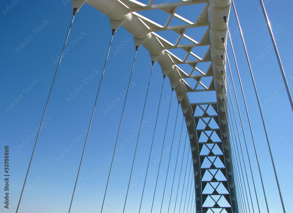 Obraz premium Part of the bridge on the blue sky