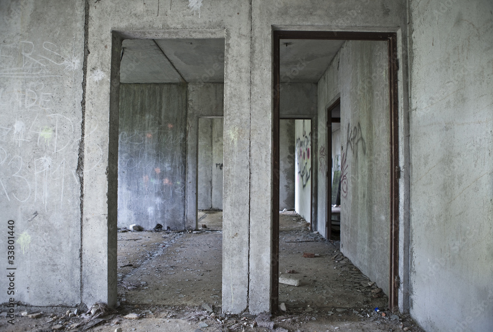 Inside gray abandoned concrete house