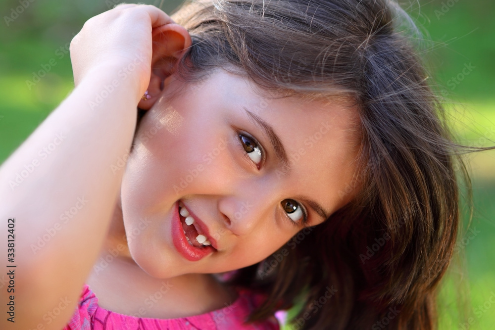 Cute Smiley Little Girl Looking Cute Smiley Little Girl Looking