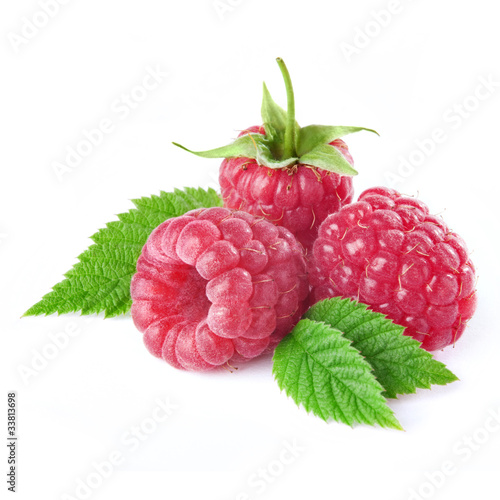 raspberries with leaves isolated on white background