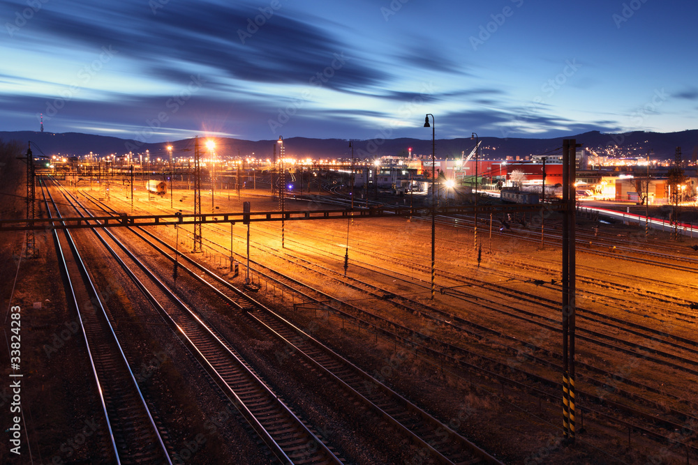 Railway lines at night.