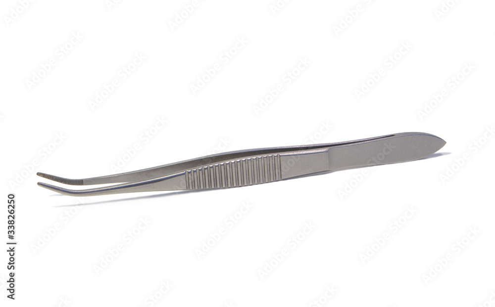 Obraz premium Surgical forceps at white background