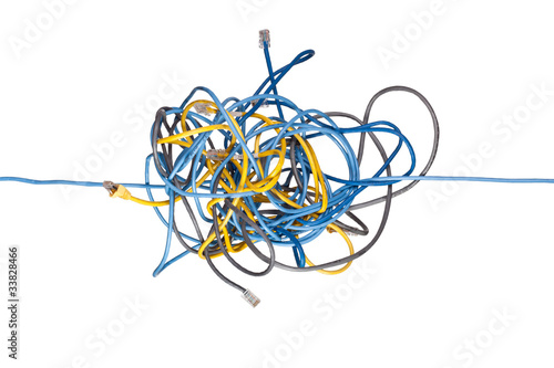 Network cable going through a tangled bunch of cables isolated