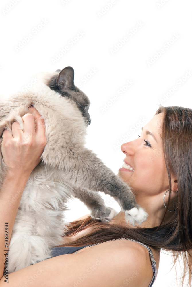 Young pretty woman hold her lovely Ragdoll cat with blue eye