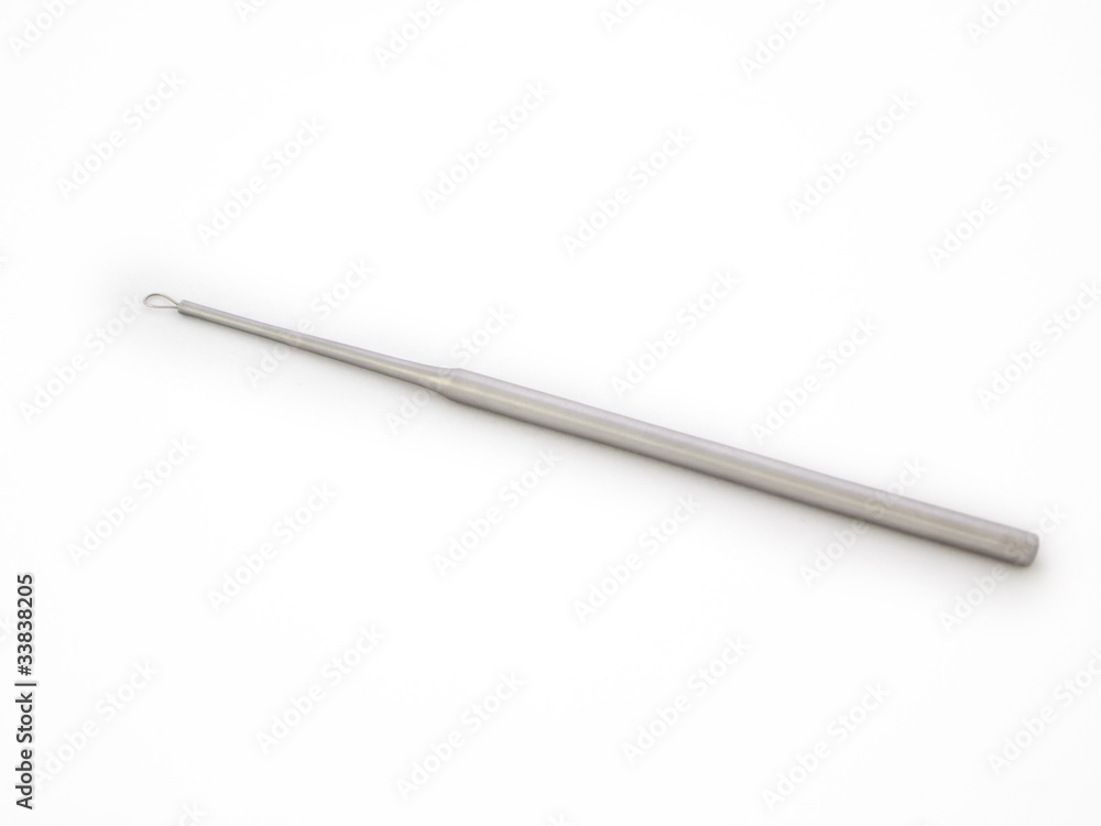 Cerumen curette isolated on a white background Cerumen curette isolated on a white background