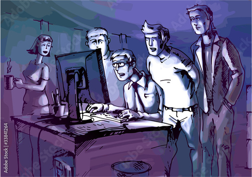 The people are looking at a computer monitor.