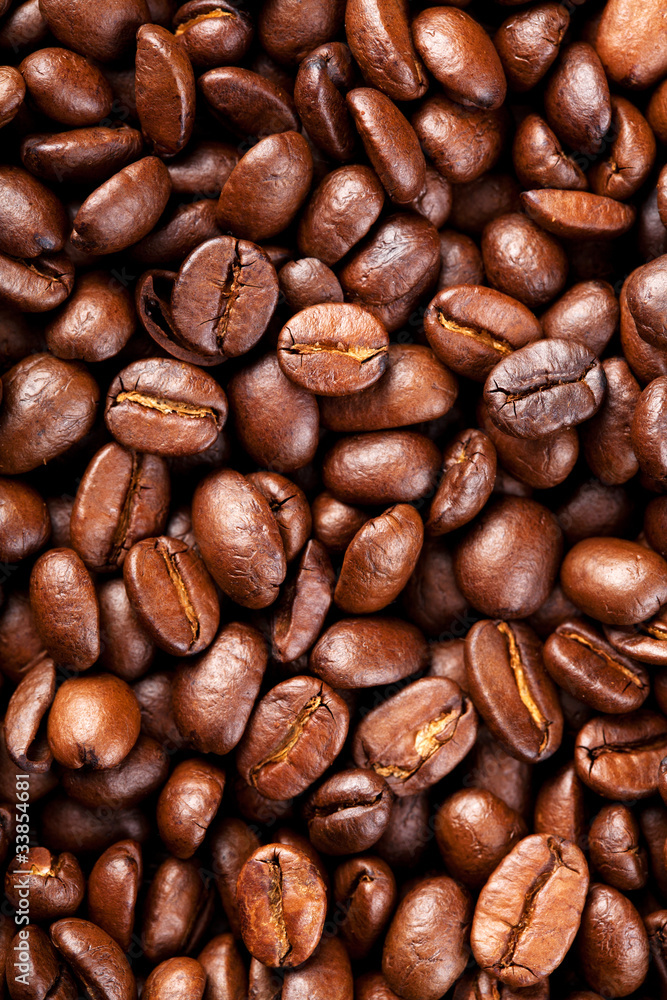 Naklejka premium roasted coffee beans background