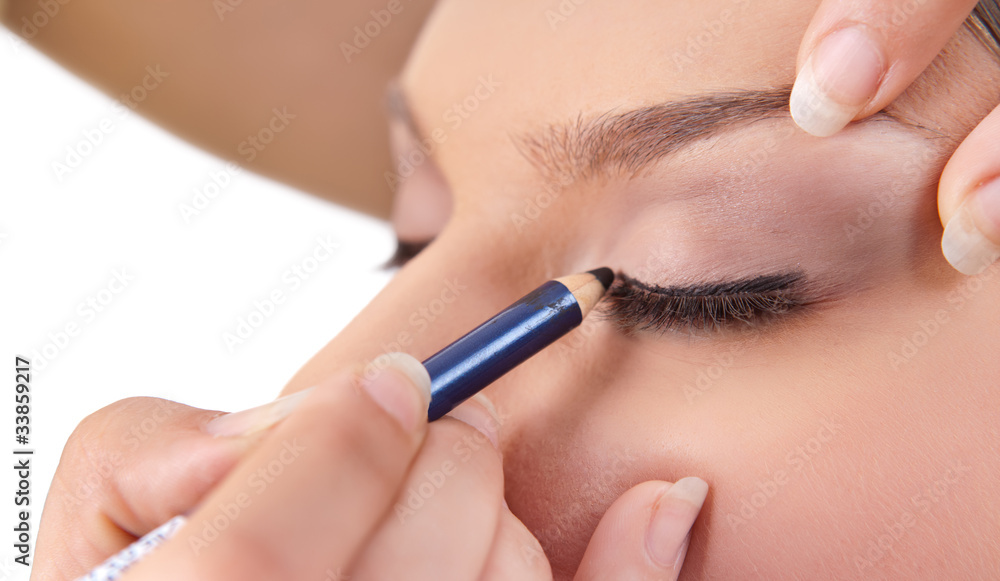 make-up artist applying make up