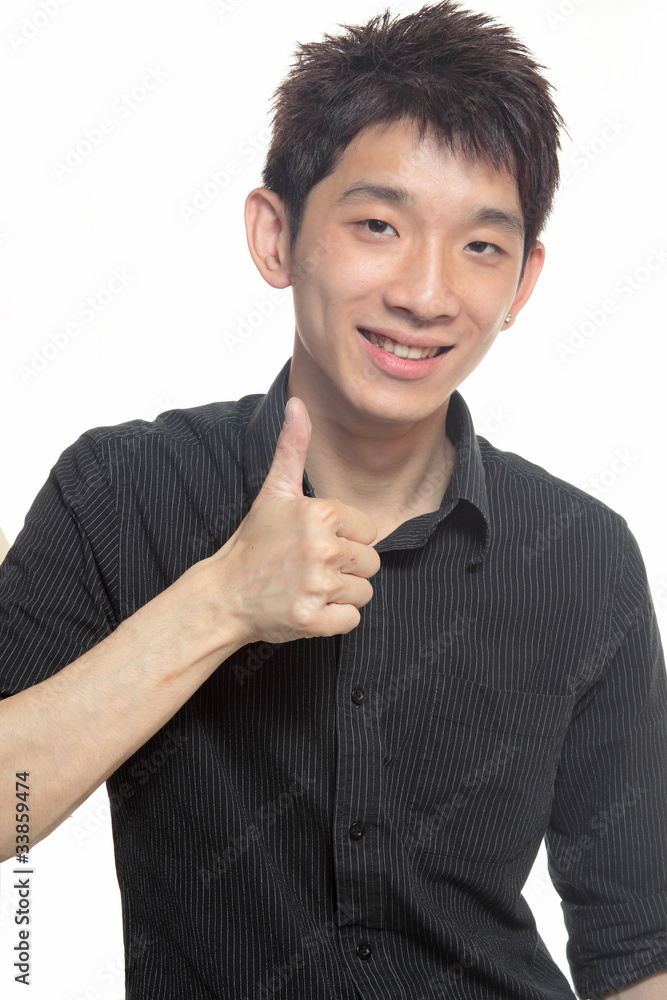 Portrait of hand showing goodluck sign against white background Portrait of hand showing goodluck sign against white background