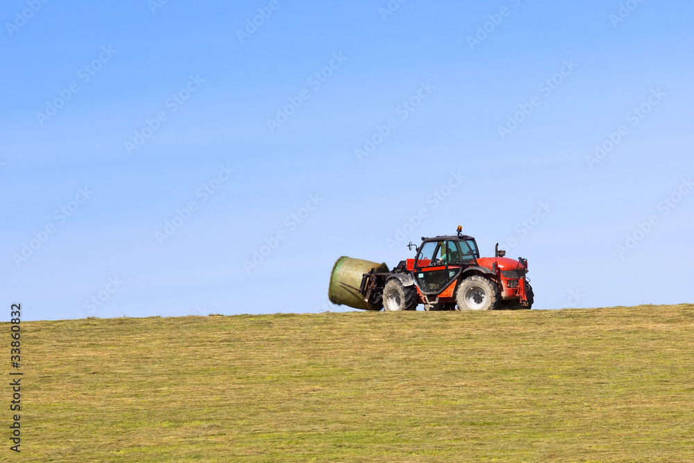 Fototapeta premium collecting bales