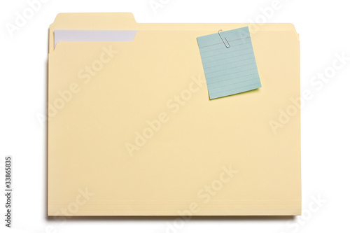File folder with note clipped on it on white