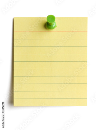 Yellow note pad pinned on white background